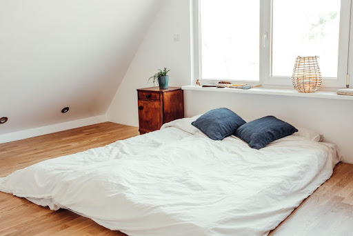 Mattress on the floor.