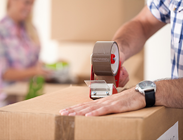 moving box being taped