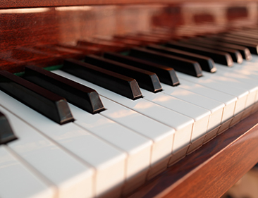 keys on wooden piano