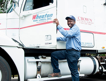 person getting into wheaton moving van