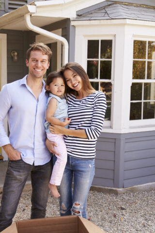 family outside of house