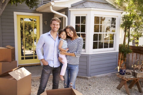 family outside of house