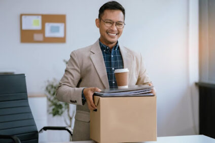 Man carrying a box.