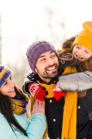 family in winter coats