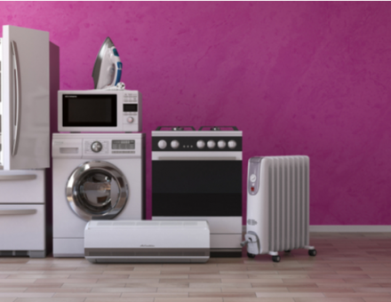 Set of household home appliances on pink background