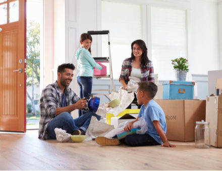A blended family unpacks in their new home.