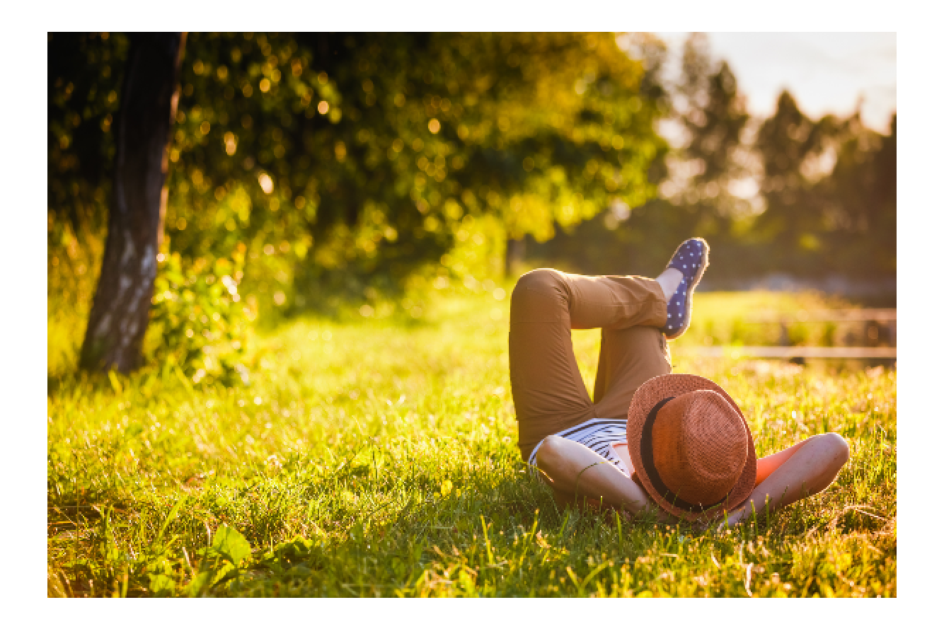 Person lounging in field