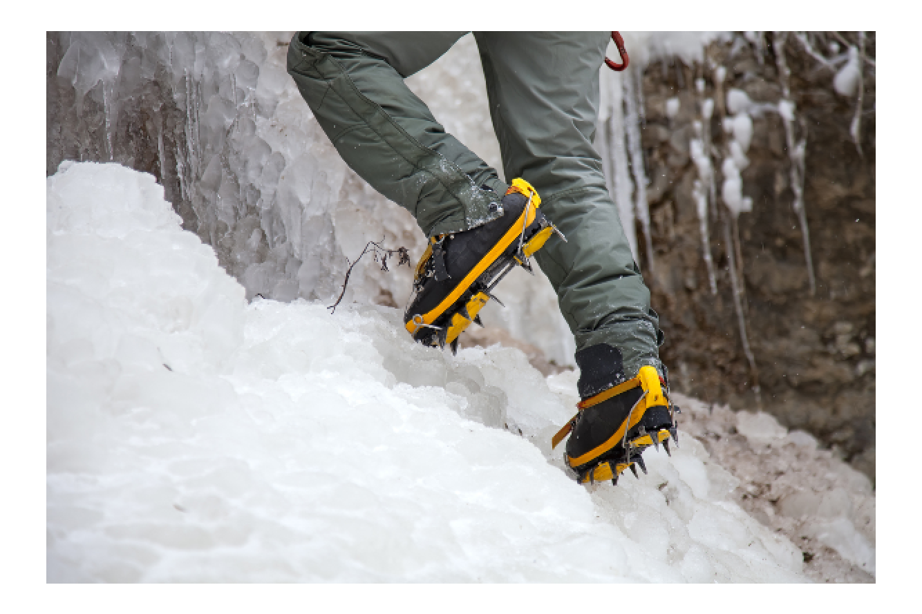 Person climbing with microspikes