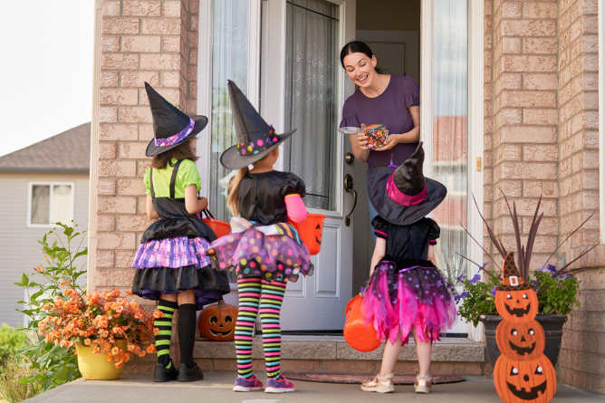 Handing out Halloween candy 