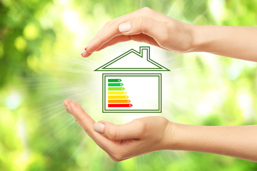 Graphic of home being held by hands with green background. 