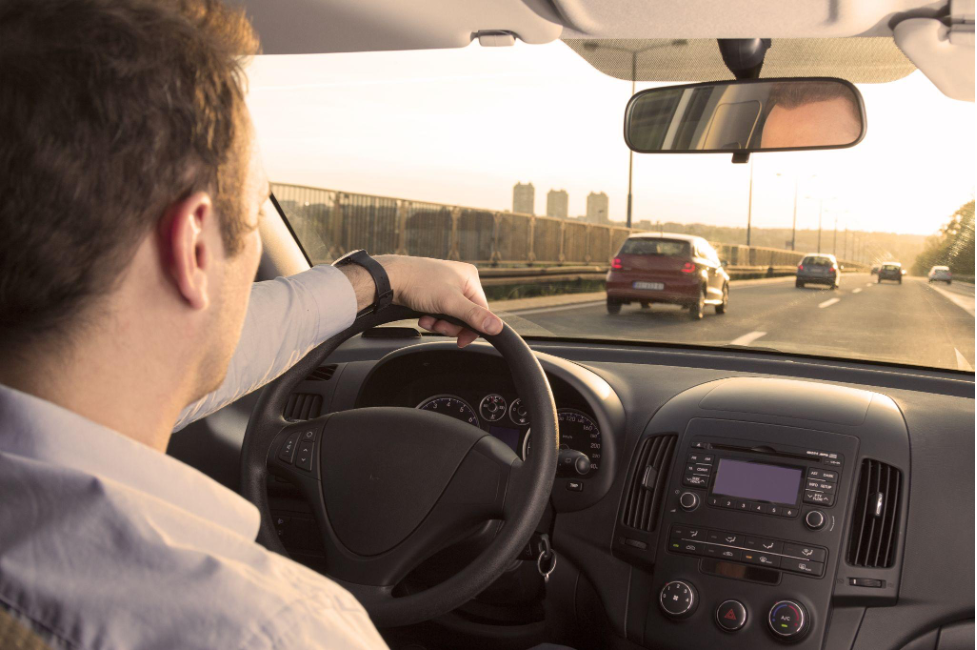 Man driving on his way to work
