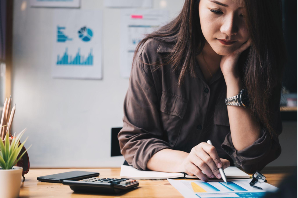 Woman checking expenses