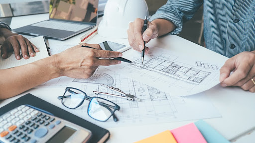 People working on a desk.